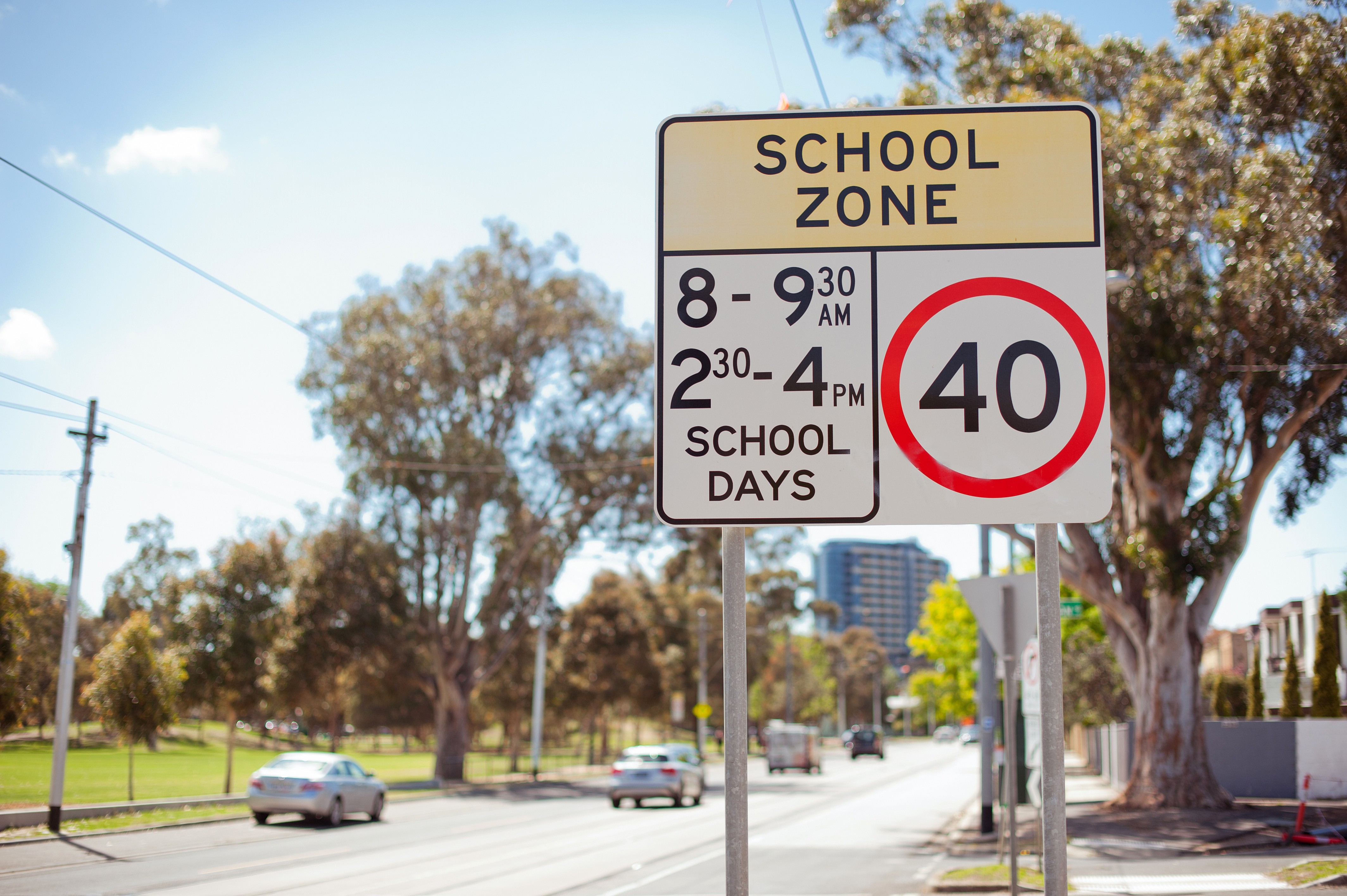 A school zone road sign
