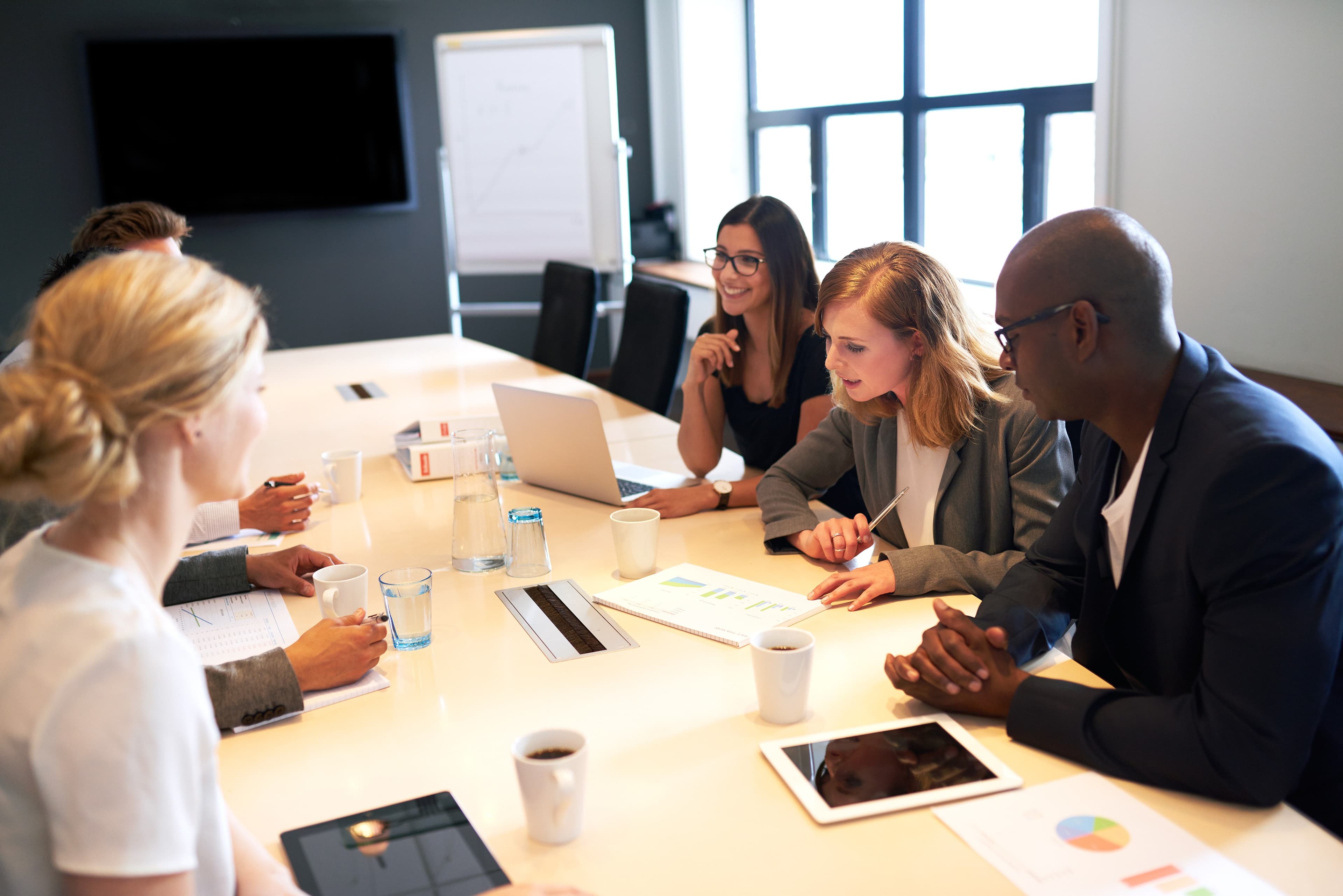 An independent school leadership team in a board meeting
